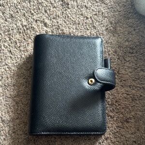 Black Leather Wallet with Snap Closure